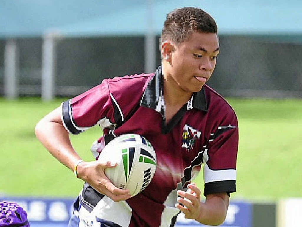 Sam Kafoa looks for a gap in the defence during the Gary Larson 9s at Marley Brown Oval. Sam Kafoa looks for a gap in the defence during the Gary Larson 9s at Marley Brown Oval.