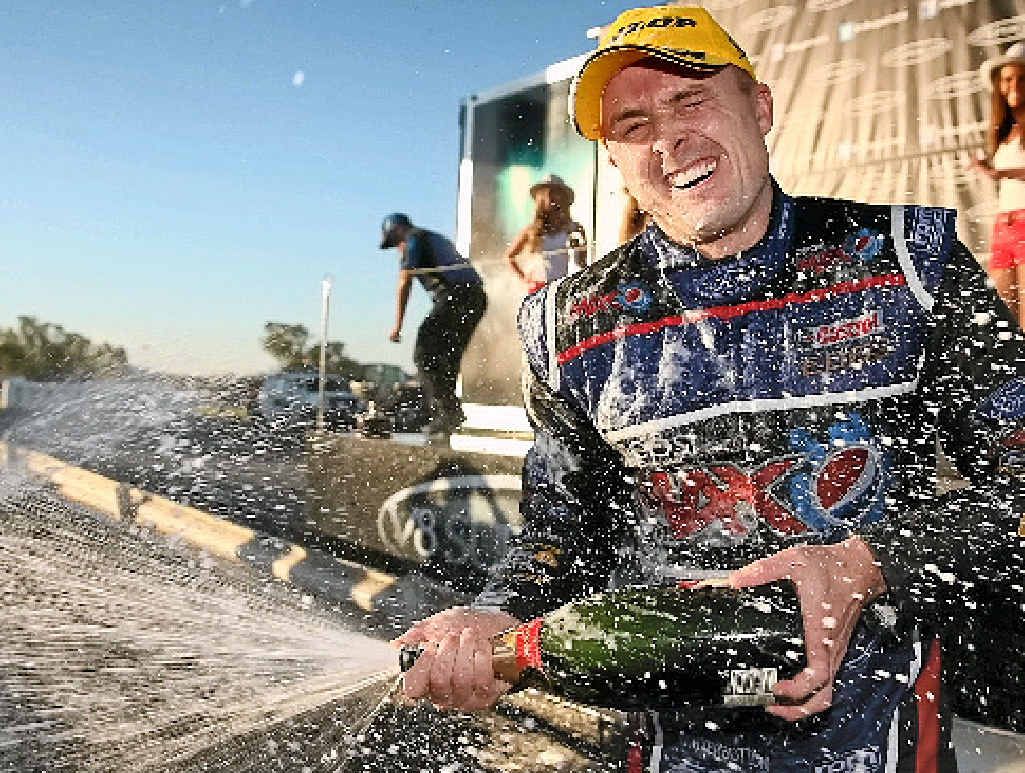 Mark Winterbottom celebrates after winning yesterday’s Winton 400, in Victoria. Mark Winterbottom celebrates after winning yesterday’s Winton 400, in Victoria.