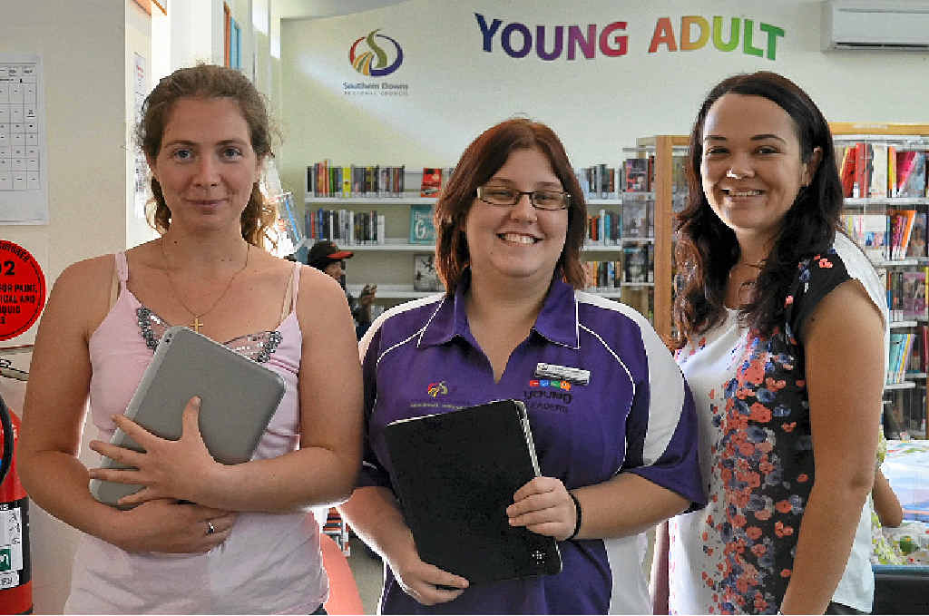 FILMING FUN: Marliese Miller, Elizabeth Dennis and Hailey Cosh at yesterday’s Digital Movie and Photography Workshop.