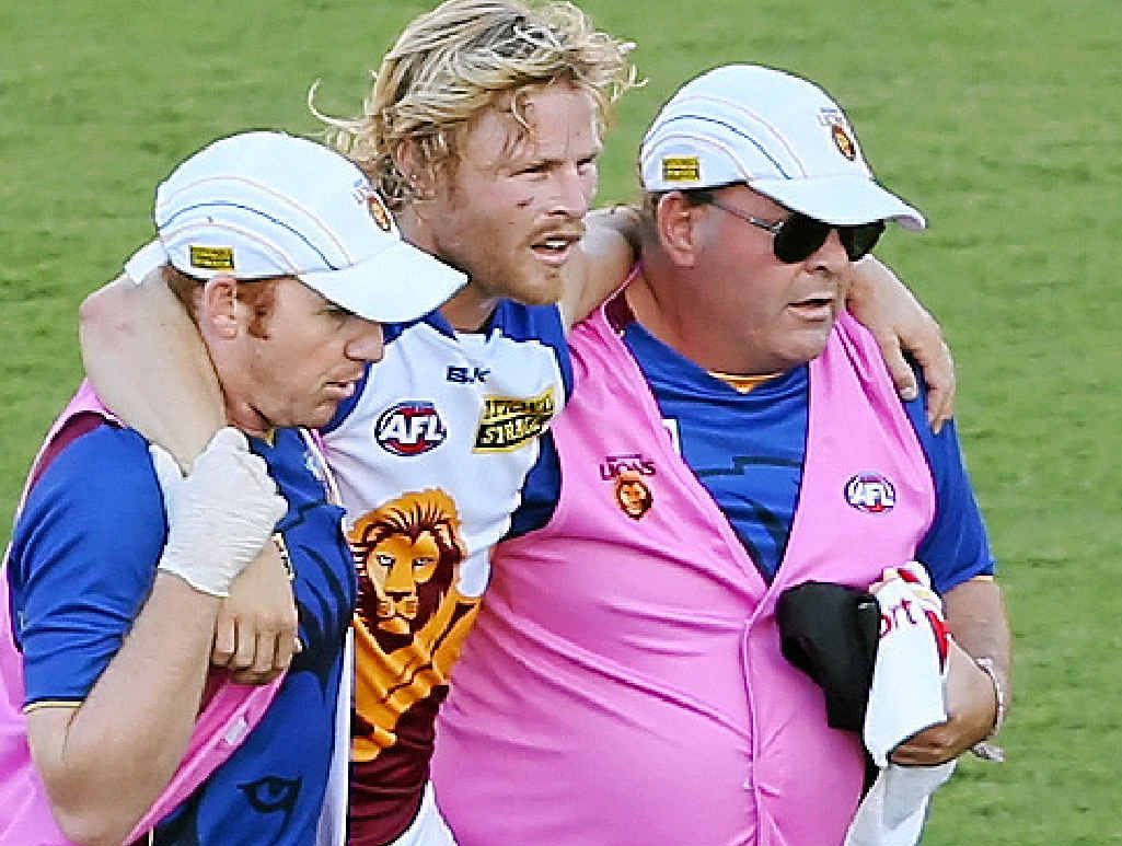 Daniel Rich being helped off the field. Daniel Rich being helped off the field.