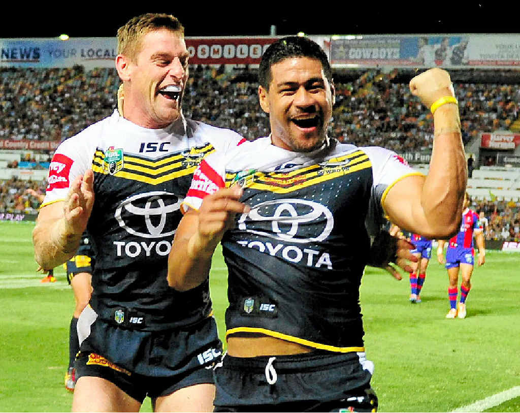 Cowboys winger Matthew Wright (right) celebrates with Brent Tate after he scored a try against the Newcastle Knights at 1300SMILES Stadium in Townsville last night. Cowboys winger Matthew Wright (right) celebrates with Brent Tate after he scored a try against the Newcastle Knights at 1300SMILES Stadium in Townsville last night.