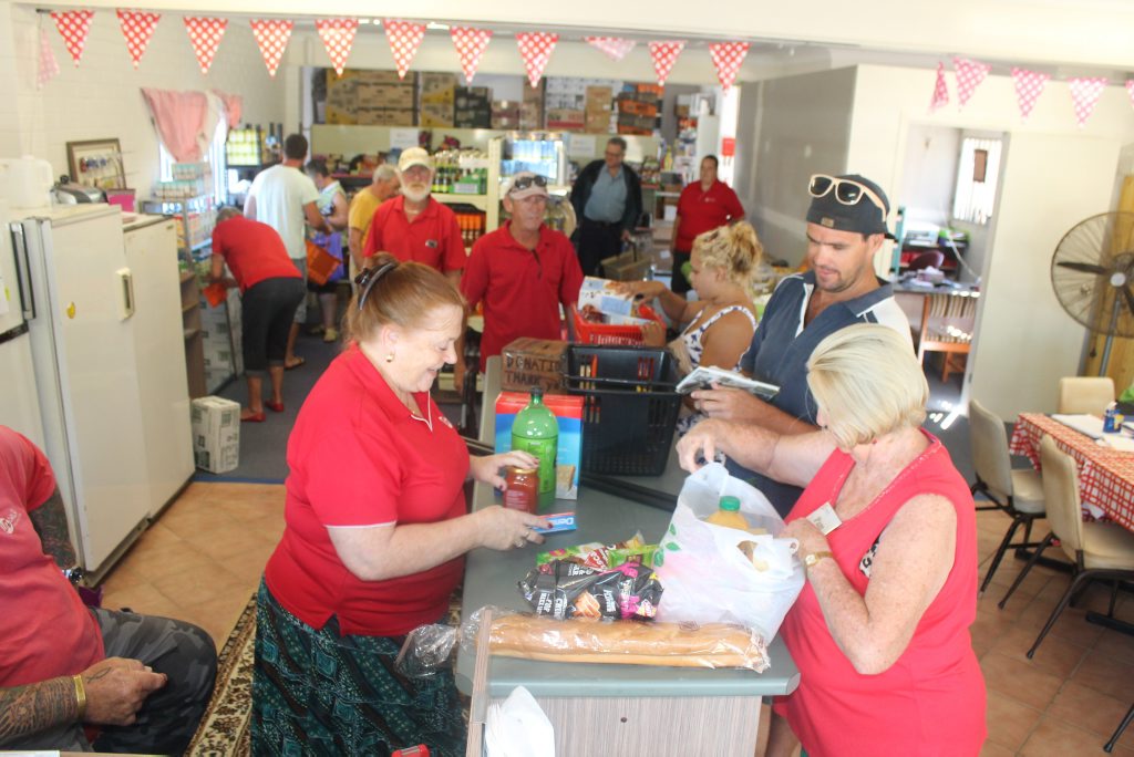 CHEAP GROCERIES: Chris Burrows serves some of the eligible people utilising the Food From Life store in Ballina. CHEAP GROCERIES: Chris Burrows serves some of the eligible people utilising the Food From Life store in Ballina.