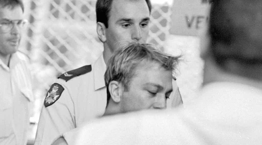 Graham Stafford is loaded into a police van after being arrested for the murder of Leanne Holland, Graham Stafford is loaded into a police van after being arrested for the murder of Leanne Holland,