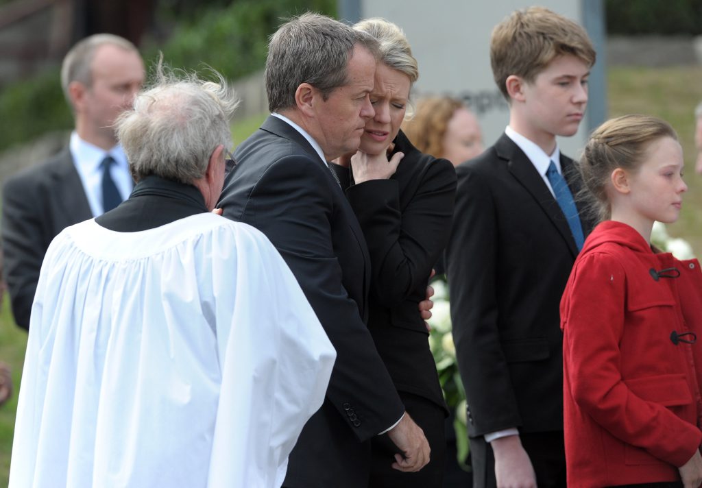 Federal Opposition leader Bill Shorten and his wife Chloe Byrce (C) embrace after the funeral of Shorten's mother, Dr Ann Shorten at Xavier College Chapel in Melbourne, Tuesday, April 15, 2014. Dr Ann Shorten died on April 6. (AAP Image/Julian Smith) NO ARCHIVING Federal Opposition leader Bill Shorten and his wife Chloe Byrce (C) embrace after the funeral of Shorten's mother, Dr Ann Shorten at Xavier College Chapel in Melbourne, Tuesday, April 15, 2014. Dr Ann Shorten died on April 6. (AAP Image/Julian Smith) NO ARCHIVING