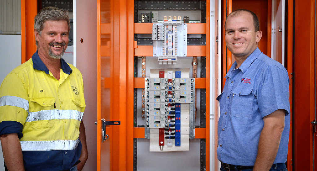 EXPORT MARKET: PHE switchboard engineering manager Ben Fitzpatrick (right) with Tritton Sheet Metal managing director Ian Tritton, in front of a locally manufactured switchboard, destined for Brunei. EXPORT MARKET: PHE switchboard engineering manager Ben Fitzpatrick (right) with Tritton Sheet Metal managing director Ian Tritton, in front of a locally manufactured switchboard, destined for Brunei.