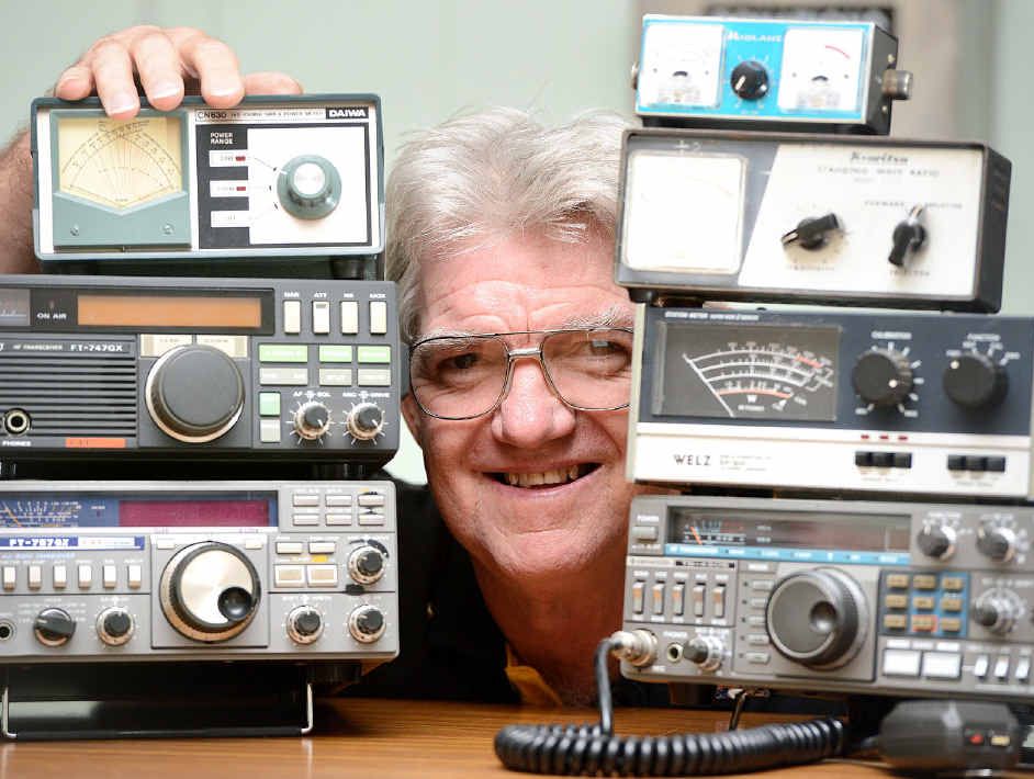 RADIO STAR: President of the Ipswich and District Radio Club Glen Woodrow shows off some of the club’s old radios.