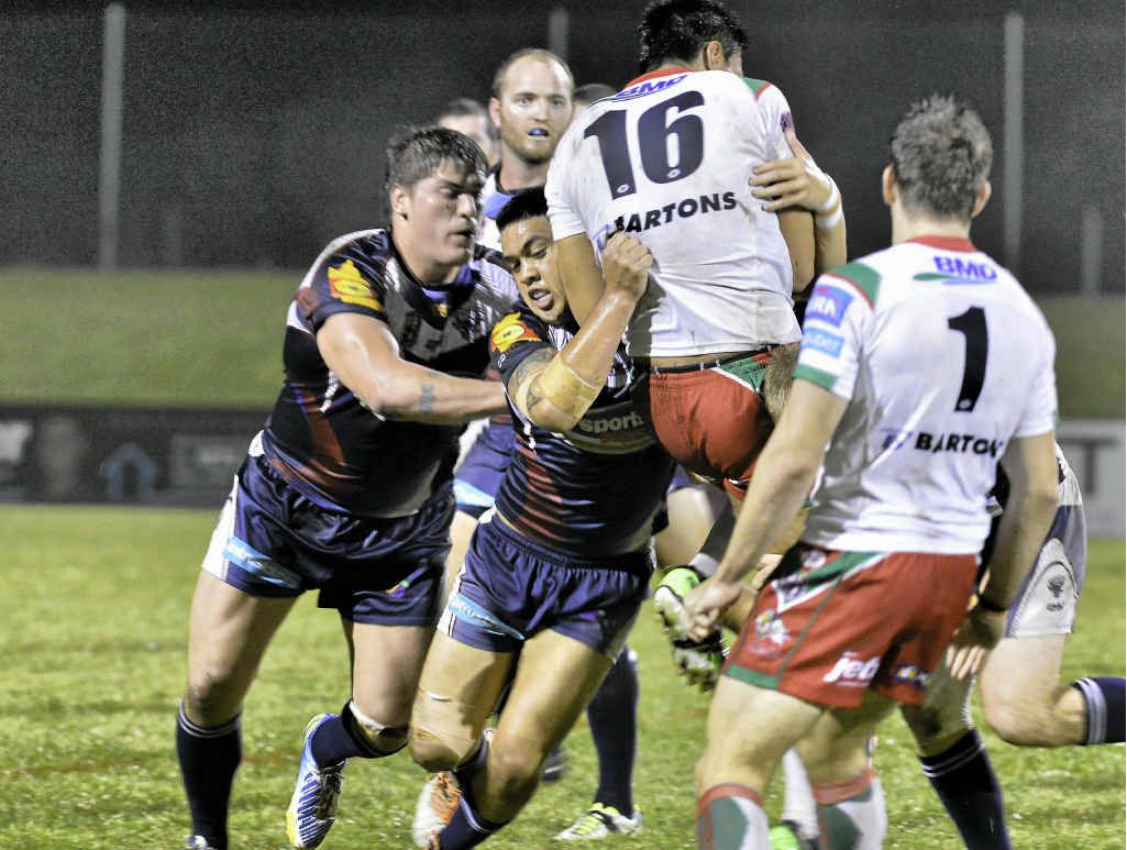 Smith Samau puts in a big tackle for the Capras against Wynnum Manly Seagulls on Thursday night. Smith Samau puts in a big tackle for the Capras against Wynnum Manly Seagulls on Thursday night.