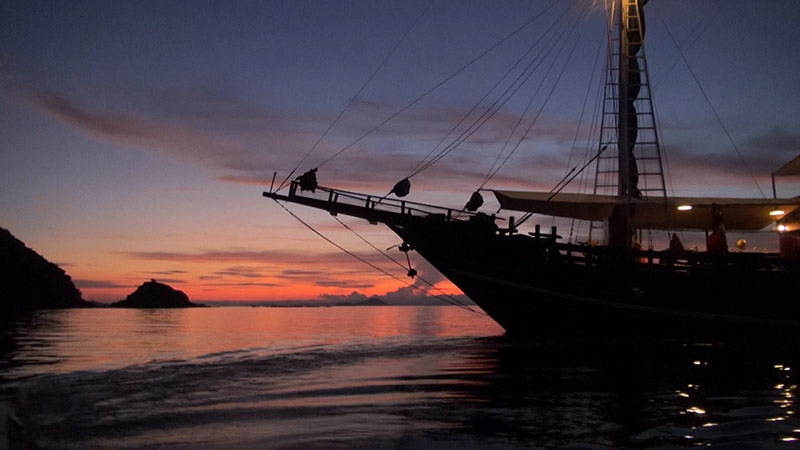 Stunning sunset: Cruising the Flores Sea, Indonesia Stunning sunset: Cruising the Flores Sea, Indonesia