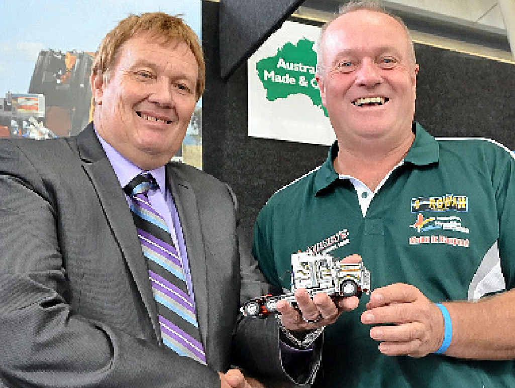 MOVING TRIBUTE: Bruce Hay and Craig Membrey, at ITTES 2014, with the Rowan truck model. MOVING TRIBUTE: Bruce Hay and Craig Membrey, at ITTES 2014, with the Rowan truck model.