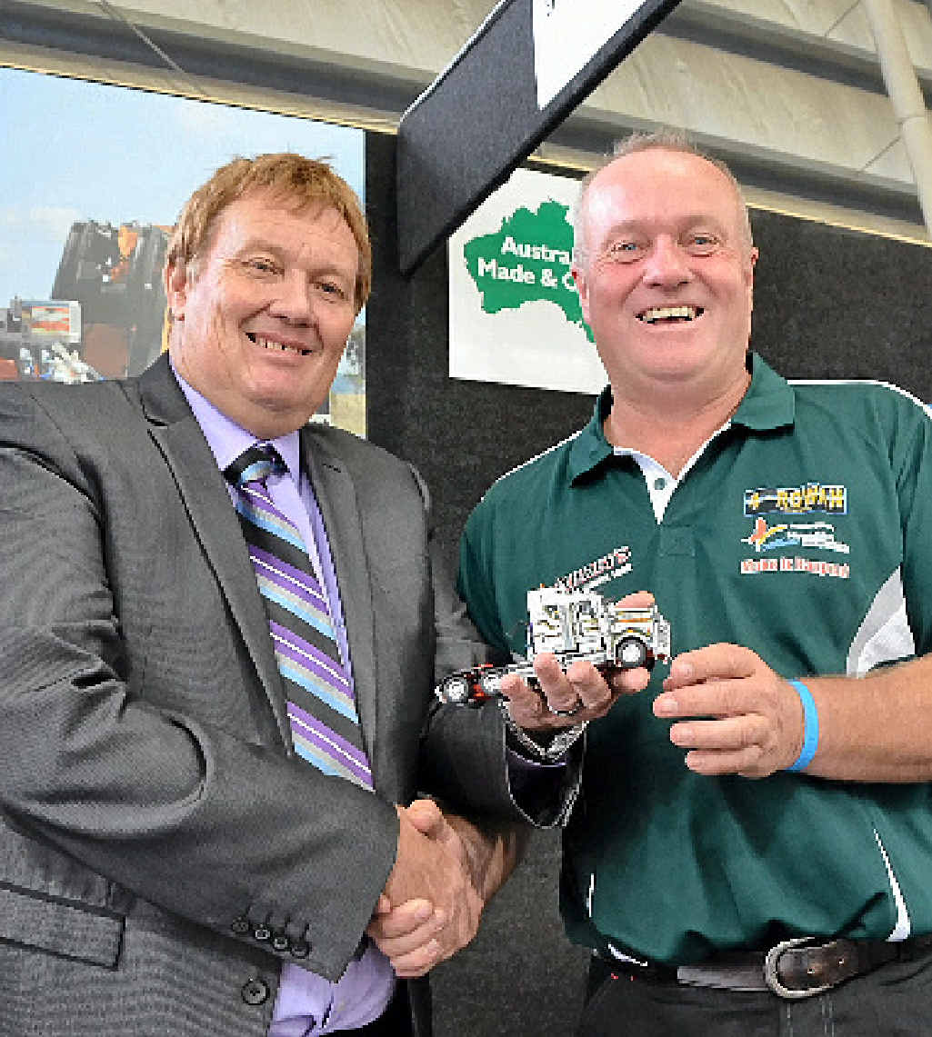 MOVING TRIBUTE: Bruce Hay and Craig Membrey, at ITTES 2014, with the Rowan truck model. MOVING TRIBUTE: Bruce Hay and Craig Membrey, at ITTES 2014, with the Rowan truck model.