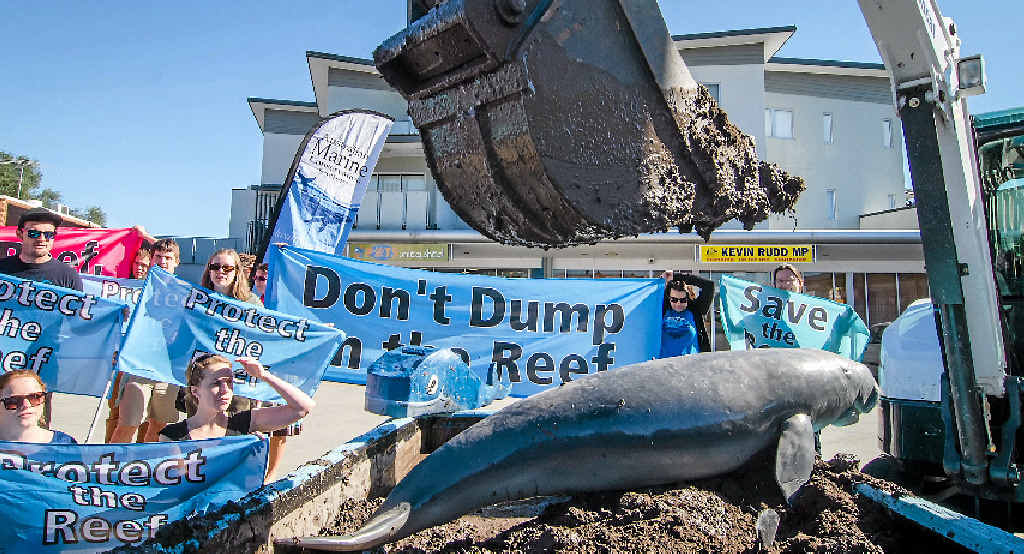 Dredged muck was dumped in front of former Prime Minister Kevin Rudd’s Brisbane office to protest dredging near the Great Barrier Reef. Dredged muck was dumped in front of former Prime Minister Kevin Rudd’s Brisbane office to protest dredging near the Great Barrier Reef.