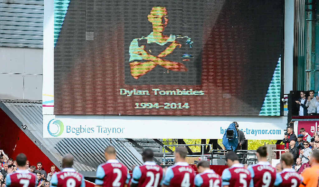 West Ham players observe a minute’s applause for Dylan Tombides ahead of the London derby with Crystal Palace. West Ham players observe a minute’s applause for Dylan Tombides ahead of the London derby with Crystal Palace.