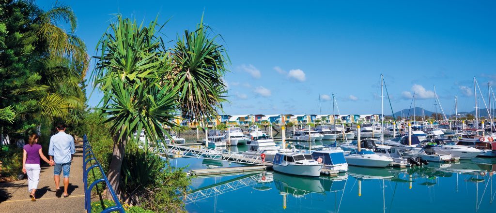Strolling along the sidewalk next to Keppel Bay Marina. Photo Courtesy of Tourism and Events Queensland Strolling along the sidewalk next to Keppel Bay Marina. Photo Courtesy of Tourism and Events Queensland