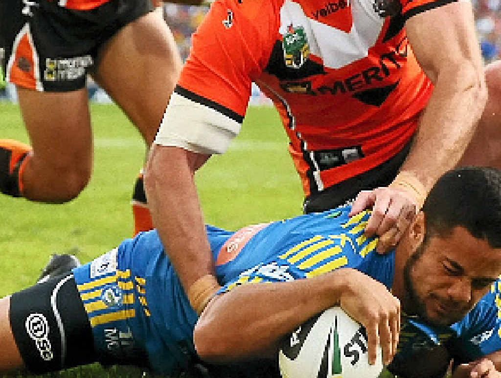 Jarryd Hayne of the Eels scores a try in the game against the Wests Tigers yesterday. Jarryd Hayne of the Eels scores a try in the game against the Wests Tigers yesterday.