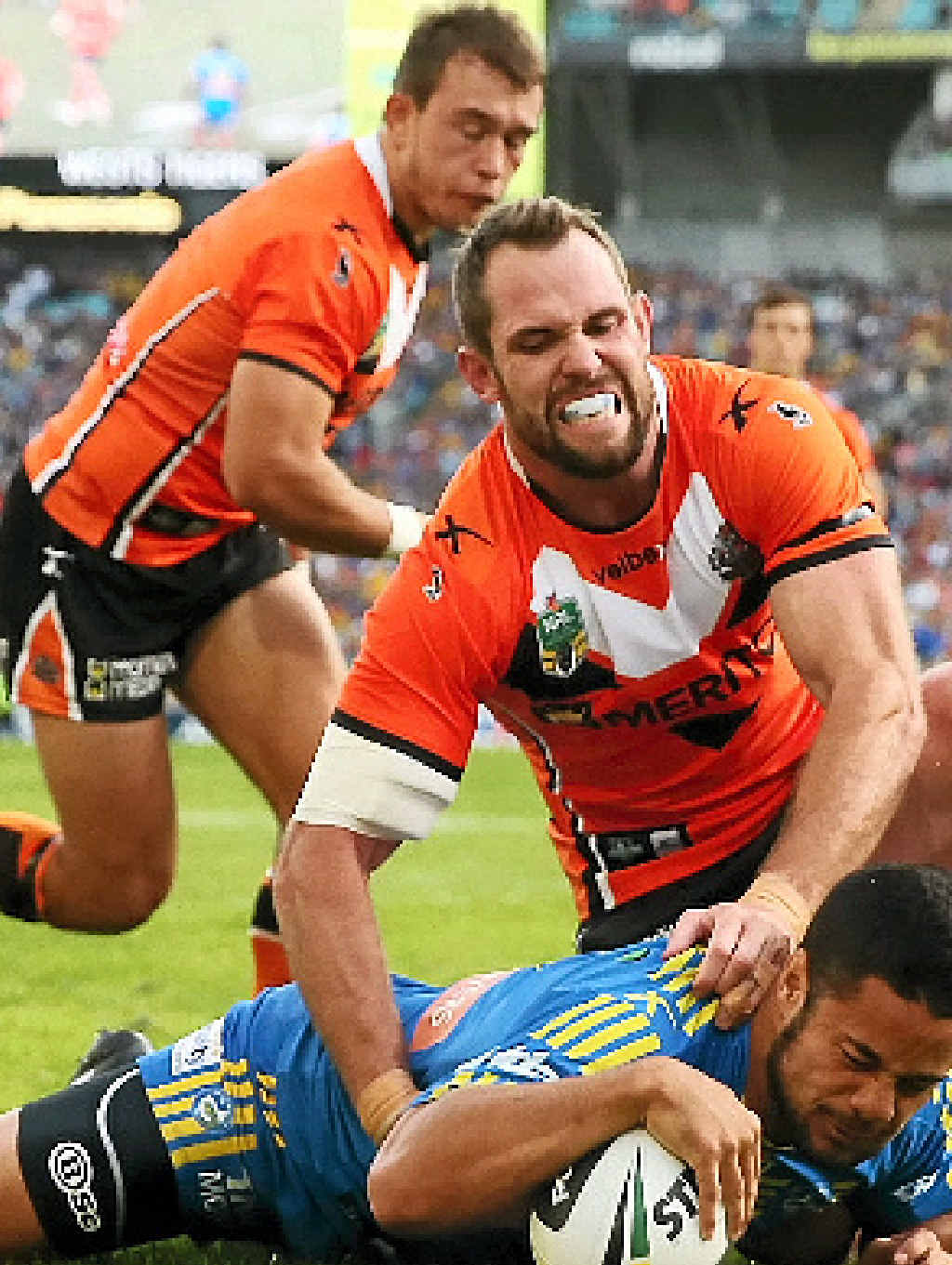 Jarryd Hayne of the Eels scores a try in the game against the Wests Tigers yesterday. Jarryd Hayne of the Eels scores a try in the game against the Wests Tigers yesterday.