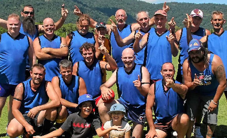 VICTORIOUS VIKINGS: Jamie Fuhrmann, Dave Crook, Peter Spratling, Max Melvin, Phil Waesch, Jack Lumby, Matt Fidler, Maurie Soars, Meech Phillpott, Bob Templeman, Dave Johnson, Len Morris, Noel Anderson, Torren Credaro, Jason Allard, Mick Jarvis, (front) Kalvin Gordon and Magenta Tulk celebrated on field after the Prickly Pinapple Vikings won the Tropical AFL Masters 12’s Cup on the weekend.