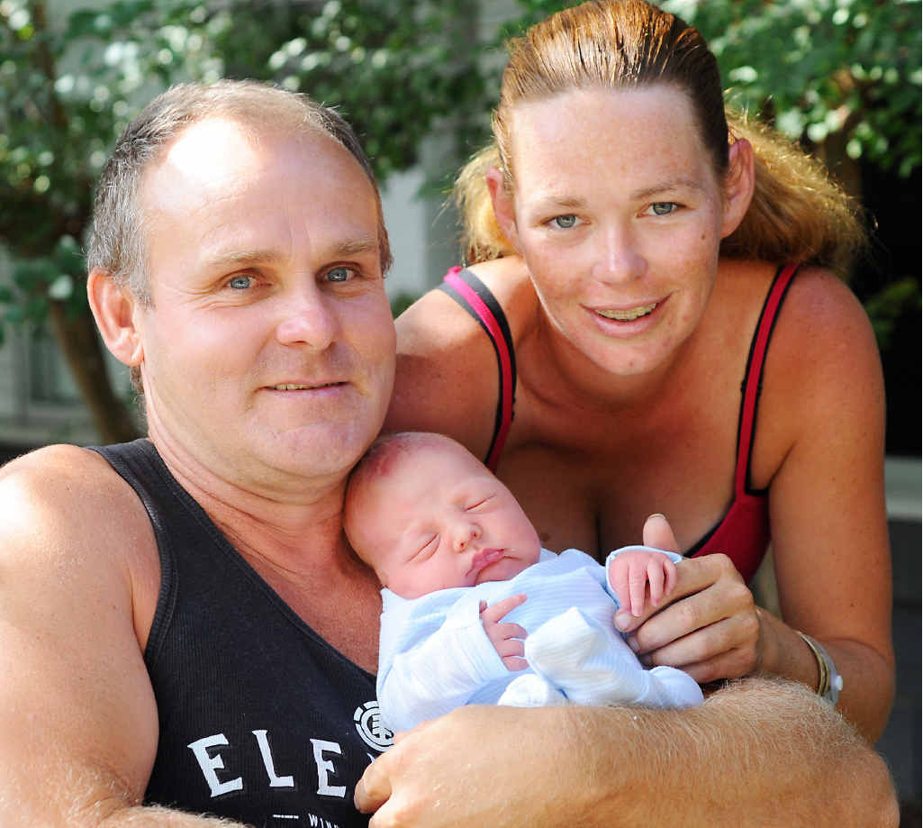 LABOUR OF LOVE: Shannon Soar and Raymond Franklin with their new baby, who was born after a police escort on Wednesday. LABOUR OF LOVE: Shannon Soar and Raymond Franklin with their new baby, who was born after a police escort on Wednesday.