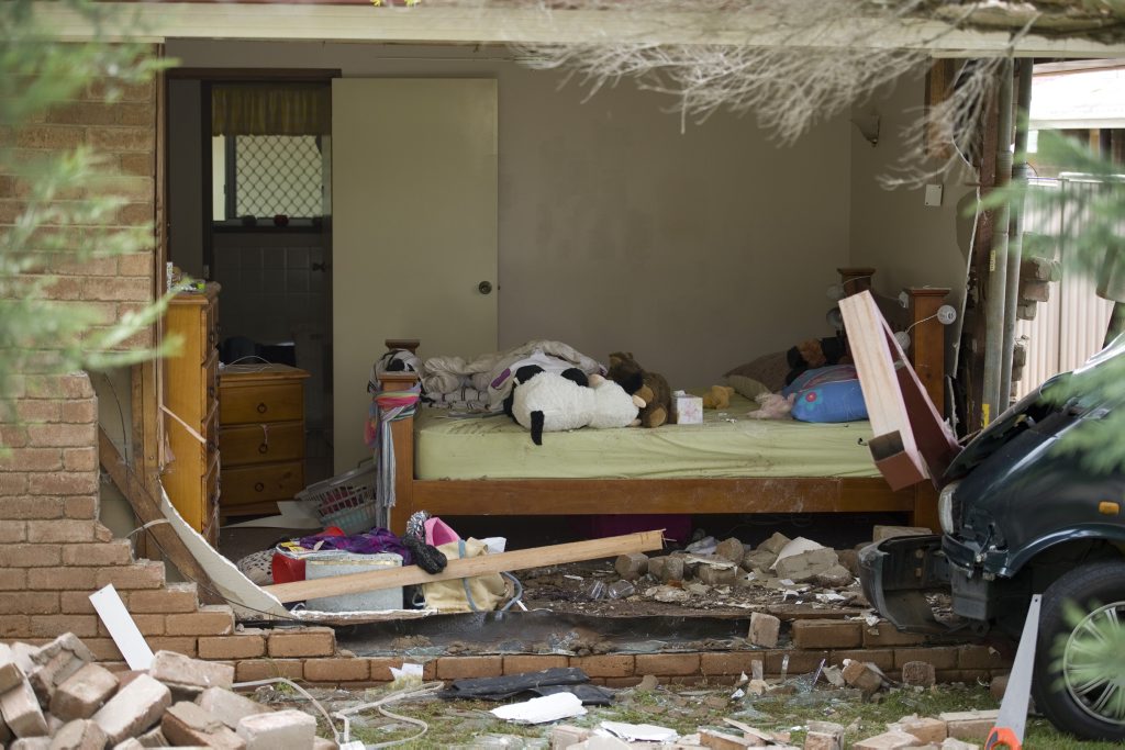 A house in Wuth St suffered major damage when a vehicle was crashed into the front corner bedroom where Ben Marshall and his partner were sleeping. A house in Wuth St suffered major damage when a vehicle was crashed into the front corner bedroom where Ben Marshall and his partner were sleeping.