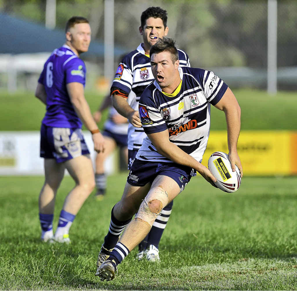 Josh Bateman looks to spread the ball wide in his side’s win over Valleys. Josh Bateman looks to spread the ball wide in his side’s win over Valleys.