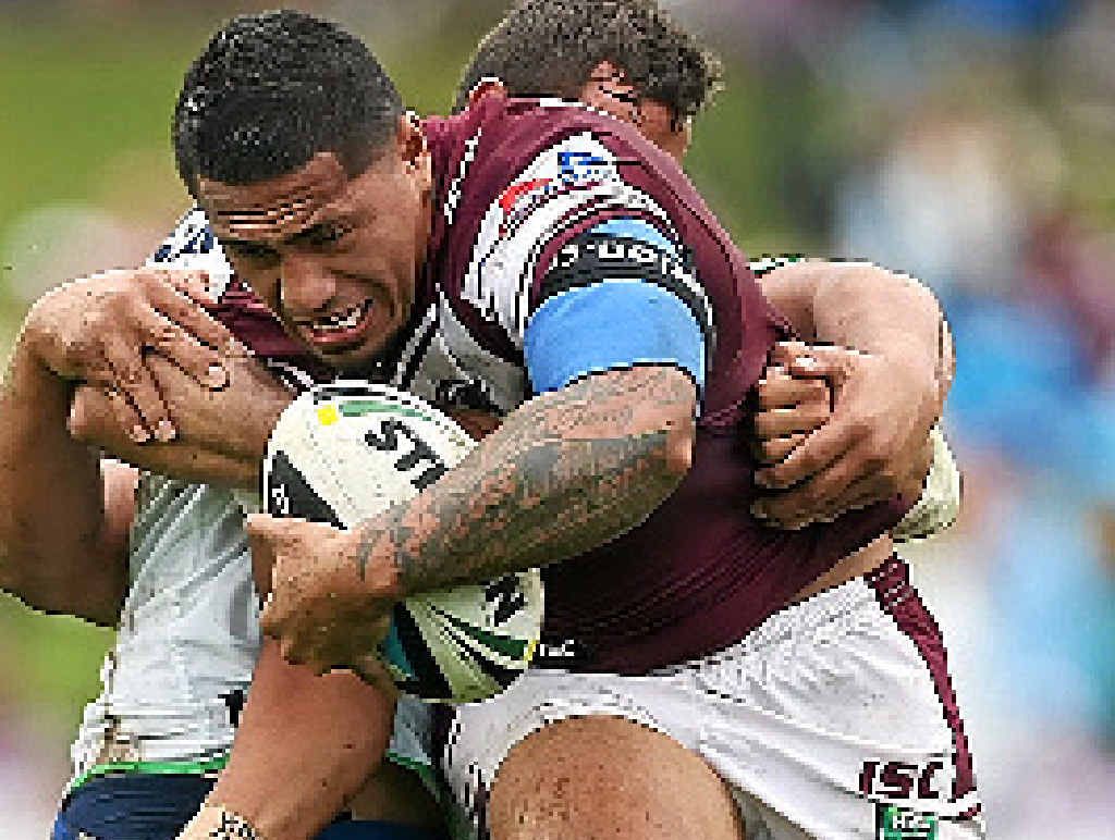 Jorge Taufua of the Sea Eagles is tackled. Jorge Taufua of the Sea Eagles is tackled.