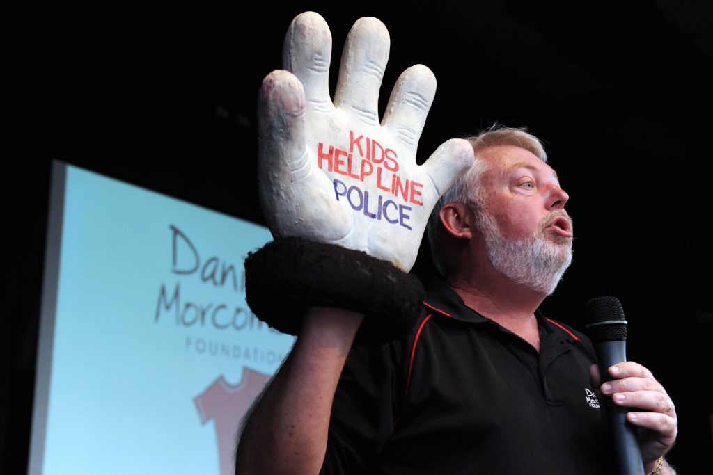 Bruce Morcombe holds up one of his helping hands to remind Xavier Catholic College middle school students who to call if they need help. Bruce Morcombe holds up one of his helping hands to remind Xavier Catholic College middle school students who to call if they need help.