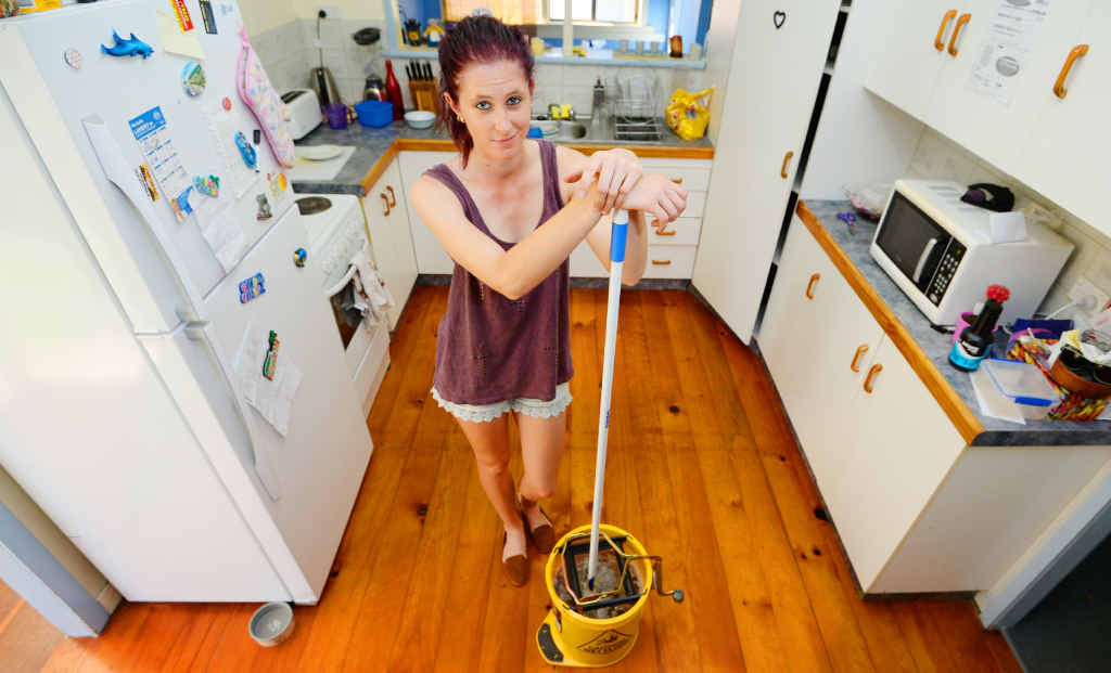 CLEANING LADIES: Gabby Dargel’s hard at work mopping the kitchen and proving women do more housework than men. CLEANING LADIES: Gabby Dargel’s hard at work mopping the kitchen and proving women do more housework than men.