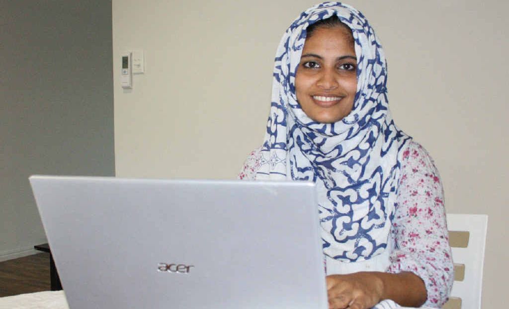 WELL STUDIED: Mother and former CQUniversity student Nusra Noorudheen going through her emails. WELL STUDIED: Mother and former CQUniversity student Nusra Noorudheen going through her emails.