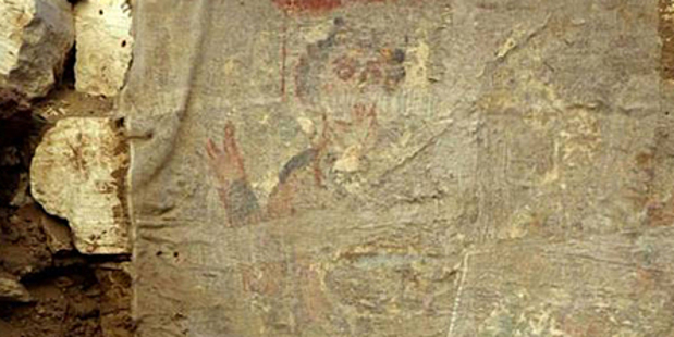An image buried deep within crypt shows a young man with curly hair, who appears to be giving a blessing . Photo / University of Barcelona An image buried deep within crypt shows a young man with curly hair, who appears to be giving a blessing . Photo / University of Barcelona