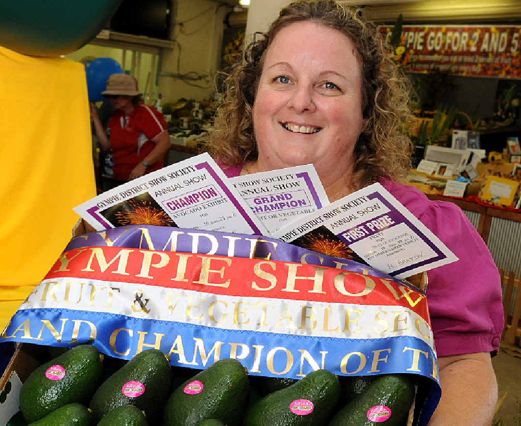 GRAND CHAMPIONS: Steward Marianne Wyllie with winning Kandanga avocados at an earlier Show. GRAND CHAMPIONS: Steward Marianne Wyllie with winning Kandanga avocados at an earlier Show.