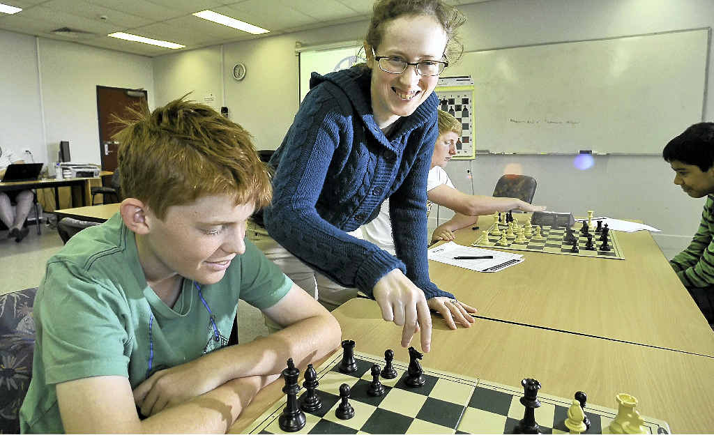 Matthew Ridden, 14, gets some instruction from top chess player Heather Richards. Matthew Ridden, 14, gets some instruction from top chess player Heather Richards.