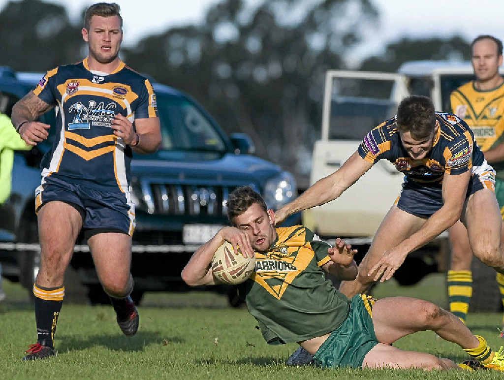 Jackson Green scores a try for Wattles in the victory against Highfields at Platz Oval, Clifton, yesterday. Jackson Green scores a try for Wattles in the victory against Highfields at Platz Oval, Clifton, yesterday.