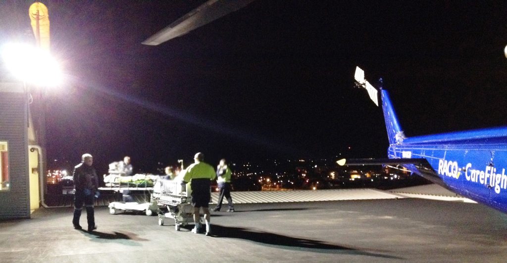 ON THE PAD: Paramedics rush a Chinchilla man in his 50s to the helicopter headed for Toowoomba Hospital. Photo Contributed. ON THE PAD: Paramedics rush a Chinchilla man in his 50s to the helicopter headed for Toowoomba Hospital. Photo Contributed.