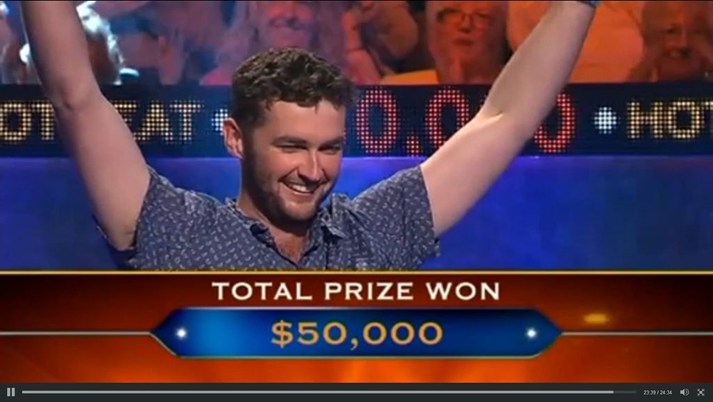 Tom Cowley celebrates his $50,000 win on Millionaire Hot Seat. Tom Cowley celebrates his $50,000 win on Millionaire Hot Seat.