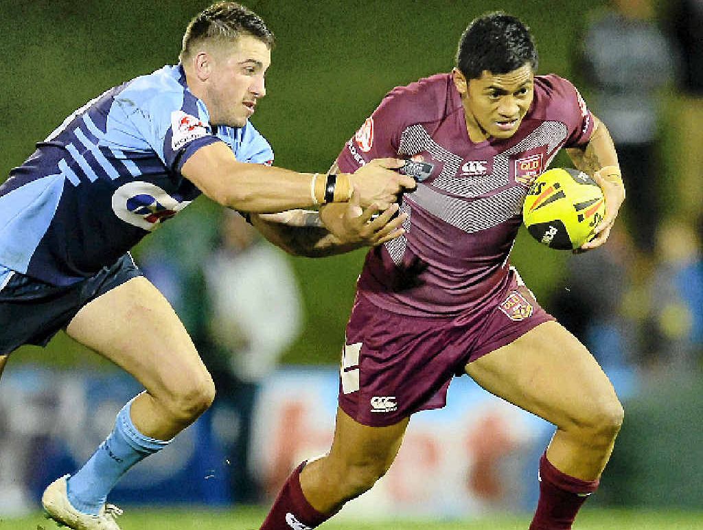Queensland’s Anthony Milford breaks free from a tackle during the U20s State of Origin match. Queensland’s Anthony Milford breaks free from a tackle during the U20s State of Origin match.