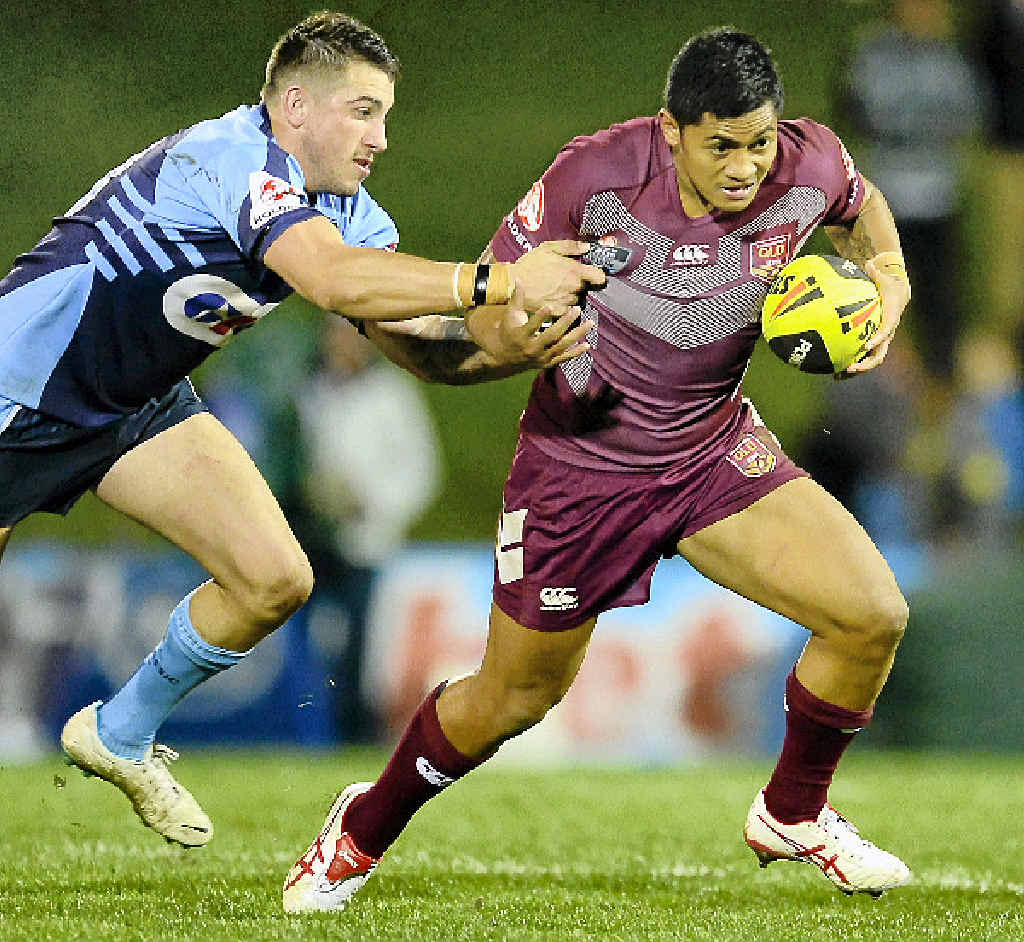Queensland’s Anthony Milford breaks free from a tackle during the U20s State of Origin match. Queensland’s Anthony Milford breaks free from a tackle during the U20s State of Origin match.