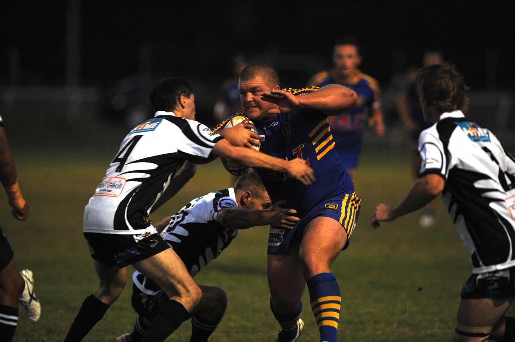 SMASH AND BASH: Marist Brothers prop Darryl Butcher takes on three Lower Clarence Magpies defenders. Photo: Matthew McInerney/The Daily Examiner SMASH AND BASH: Marist Brothers prop Darryl Butcher takes on three Lower Clarence Magpies defenders. Photo: Matthew McInerney/The Daily Examiner