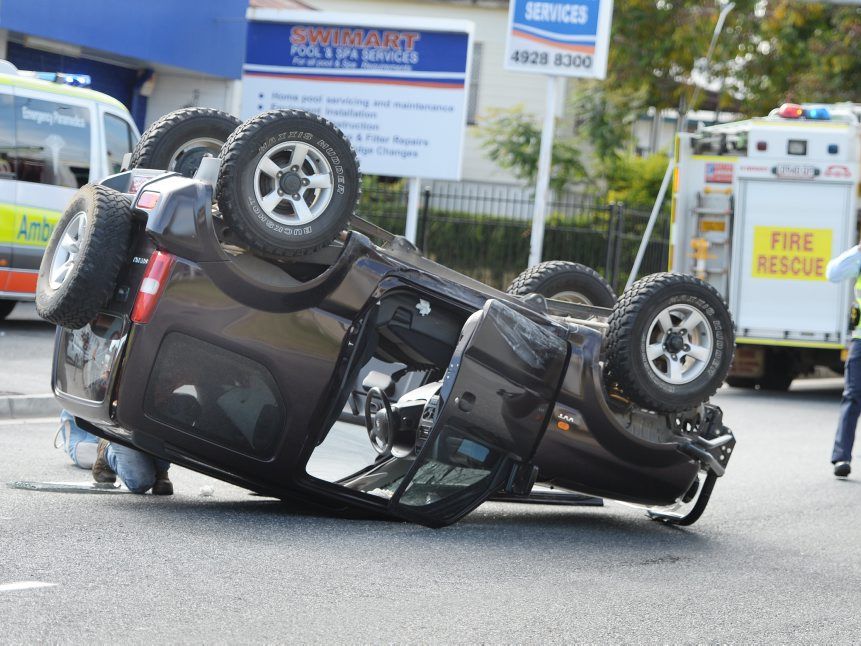 A Suzuki Jimny sits on its roof after a crash on Elphinstone Street. Photo: Chris Ison / The Morning Bulletin A Suzuki Jimny sits on its roof after a crash on Elphinstone Street. Photo: Chris Ison / The Morning Bulletin