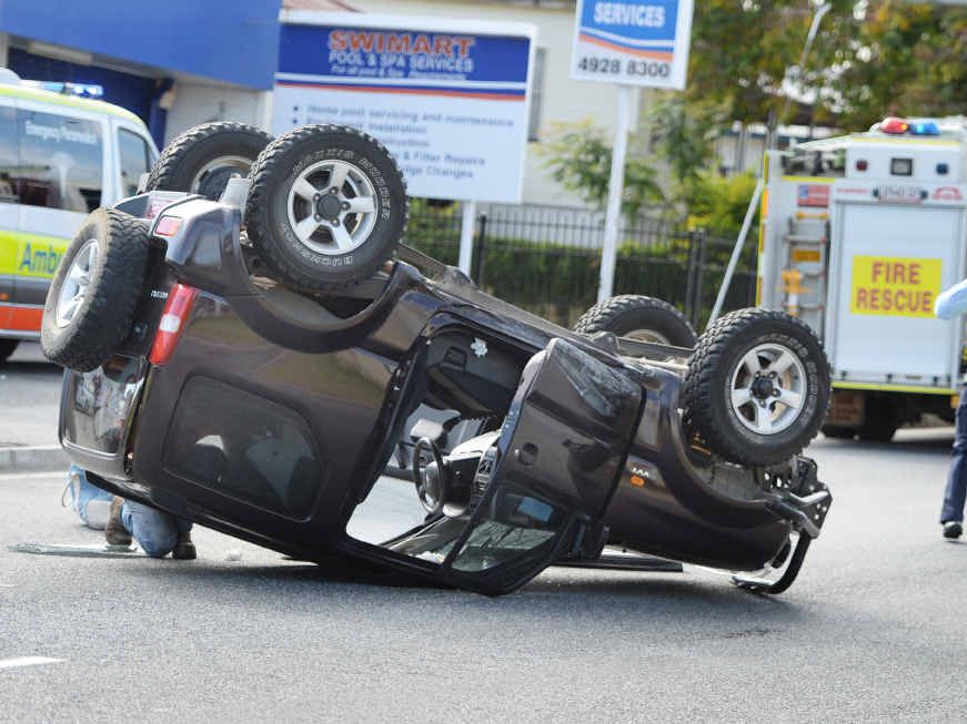 OVERTURNED: The Suzuki getting ready to be towed away after it rolled. OVERTURNED: The Suzuki getting ready to be towed away after it rolled.