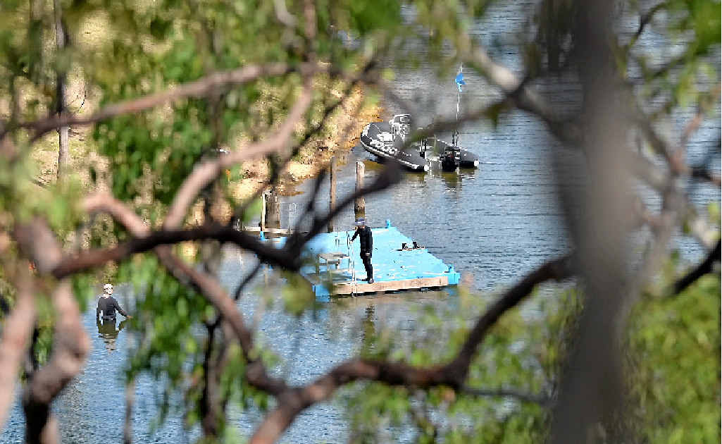 DEEP SEARCH: Police divers are searching for answers at Gladstone’s Lake Awoonga Dam. DEEP SEARCH: Police divers are searching for answers at Gladstone’s Lake Awoonga Dam.