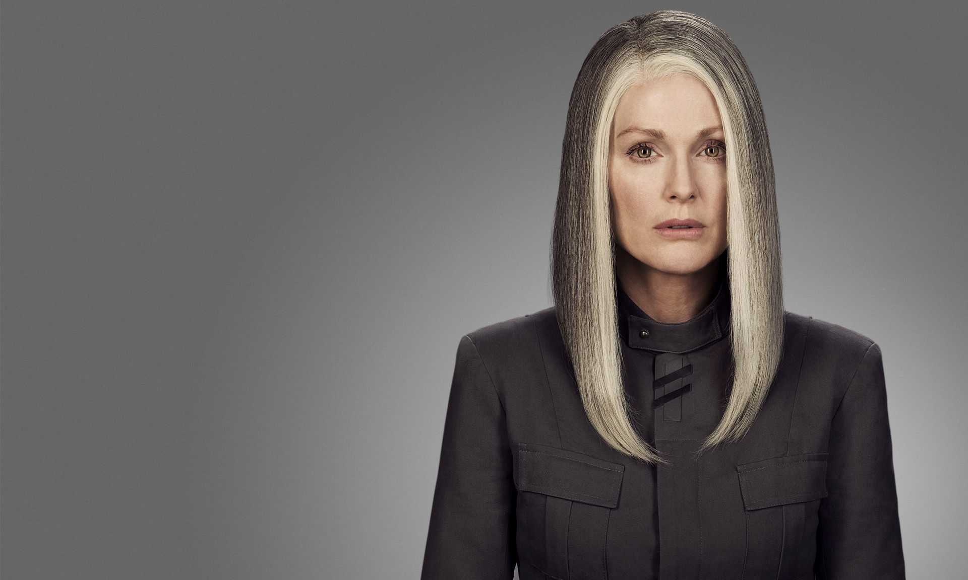 Julianne Moore as President Coin in The Hunger Games: Mockingjay Part 1 Julianne Moore as President Coin in The Hunger Games: Mockingjay Part 1