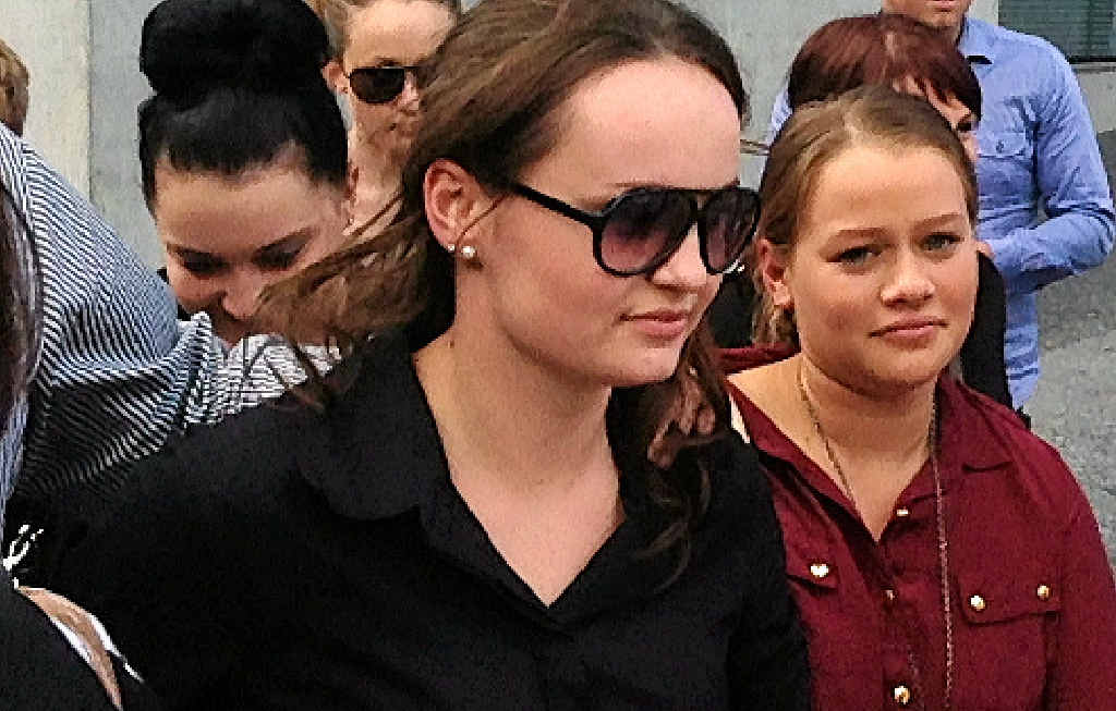IN COURT: Meghan Hopper (in sunglasses) walks with friends from Brisbane District Court. IN COURT: Meghan Hopper (in sunglasses) walks with friends from Brisbane District Court.