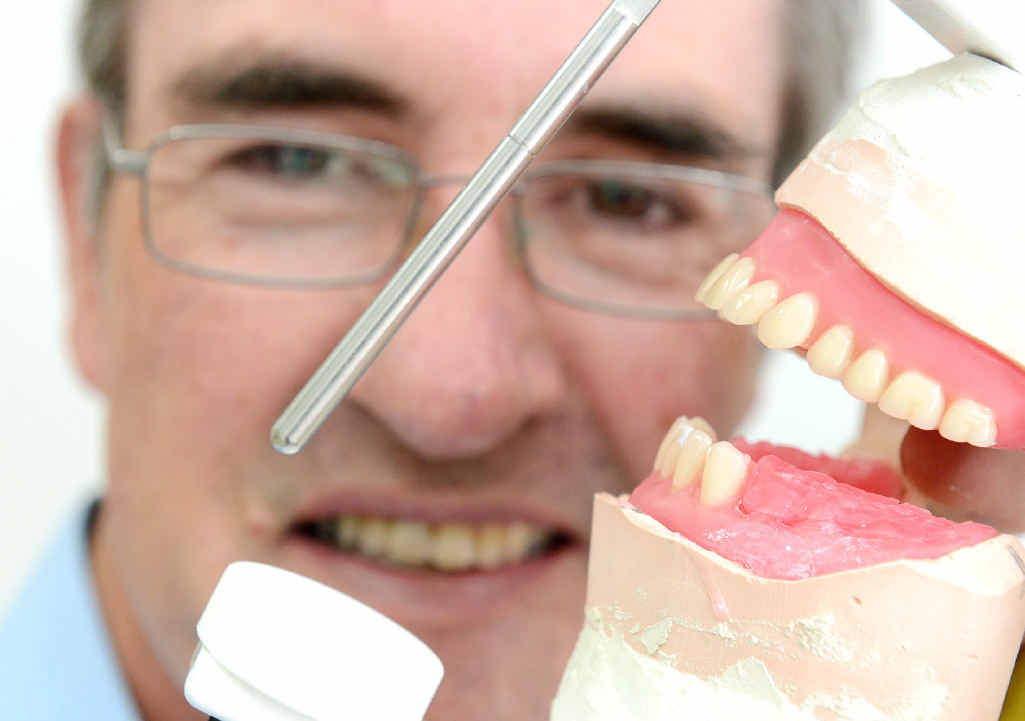 TOP SERVICE: Dental prosthetist David Banfield from Silkstone Dental Clinic with some false teeth. TOP SERVICE: Dental prosthetist David Banfield from Silkstone Dental Clinic with some false teeth.