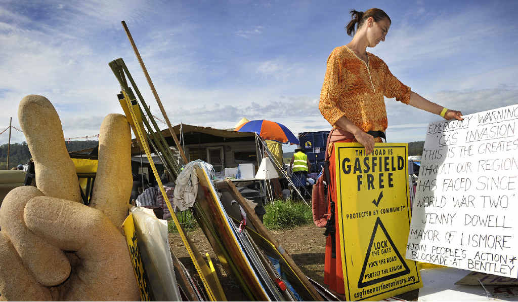 MOVING ON: Terri Nicholson of The Channon sorts the placards and posters while helping to pack up the Bentley protest site after Metgasco’s licence was suspended. MOVING ON: Terri Nicholson of The Channon sorts the placards and posters while helping to pack up the Bentley protest site after Metgasco’s licence was suspended.