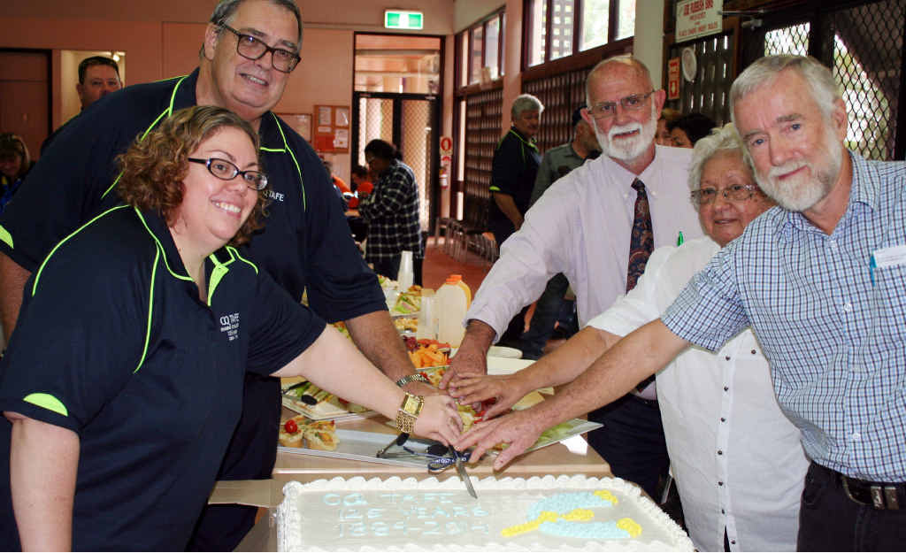 WHAT A MILESTONE! Bronwyn Jaques, Garry Kinnon, John Sefton, Kev Hacker and Aunty Denise cut the cake. WHAT A MILESTONE! Bronwyn Jaques, Garry Kinnon, John Sefton, Kev Hacker and Aunty Denise cut the cake.