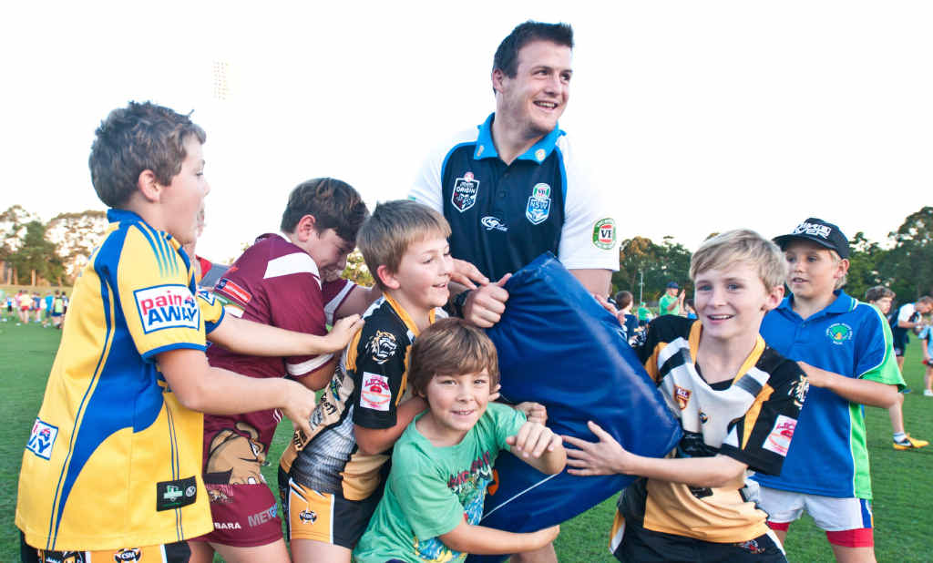 KING OF THE KIDS: Josh Morris hits the bags with the kids. KING OF THE KIDS: Josh Morris hits the bags with the kids.