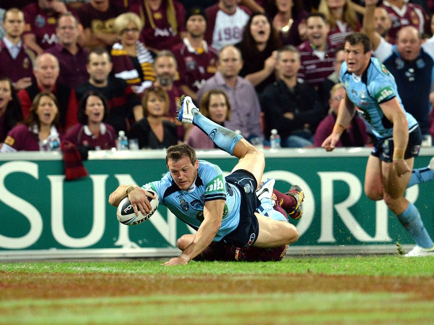 NSW Blues player Brett Morris scores a try against Queensland during Game one of the 2014 State of Origin rugby league series at Suncorp Stadium in Brisbane, Wednesday, May 28, 2014. NSW Blues player Brett Morris scores a try against Queensland during Game one of the 2014 State of Origin rugby league series at Suncorp Stadium in Brisbane, Wednesday, May 28, 2014.