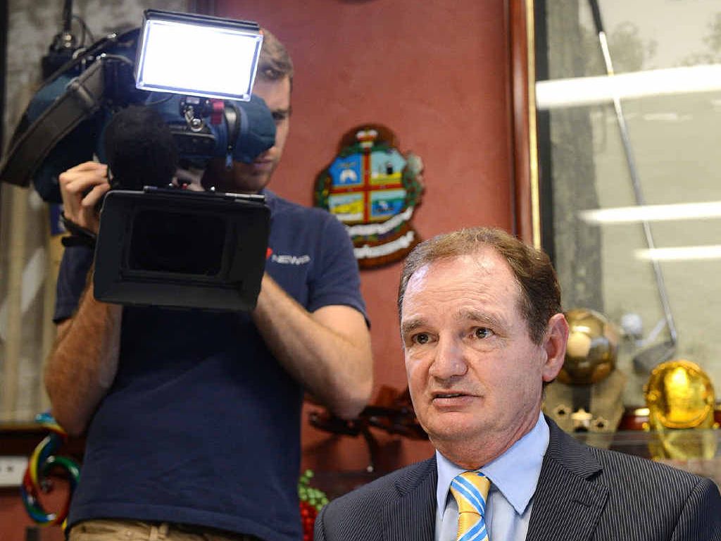 IN THE SPOTLIGHT: Ipswich mayor Paul Pisasale fronts a press conference in his office.