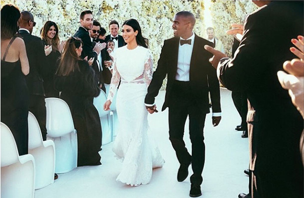 Kim Kardashian and Kanye West at their wedding (c) Kim Kardashian Instagram Kim Kardashian and Kanye West at their wedding (c) Kim Kardashian Instagram