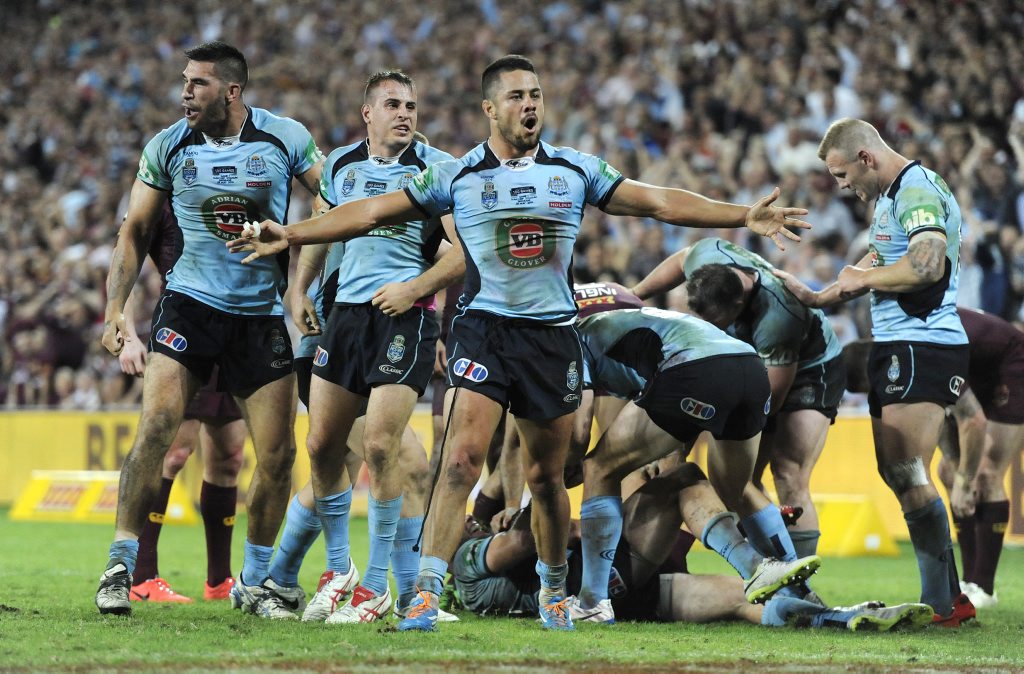 NSW Blues player Jarryd Hayne (centre) celebrates defeating Queensland in Game one of the 2014 State of Origin rugby league series at Suncorp Stadium in Brisbane. NSW Blues player Jarryd Hayne (centre) celebrates defeating Queensland in Game one of the 2014 State of Origin rugby league series at Suncorp Stadium in Brisbane.