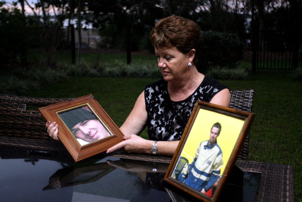 Jane Baillie looks over photos of her son, 'Robbie'. Photo Jorge Branco / Caboolture News Jane Baillie looks over photos of her son, 'Robbie'. Photo Jorge Branco / Caboolture News